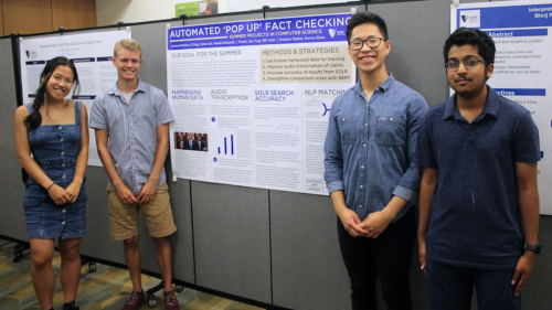 Students with research poster.